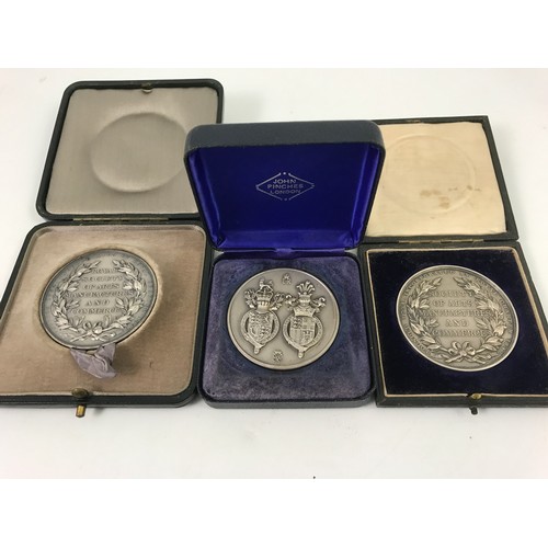 106 - 2 CASED SOCIETY OF ARTS MANUFACTURERS AND COMMERCE MEDALS TOGETHER WITH 1 OTHER