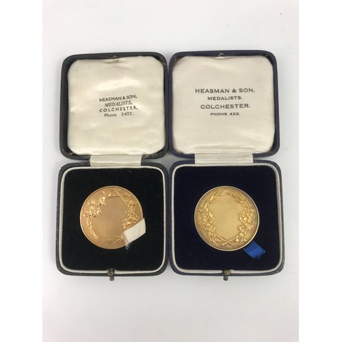 107 - 2 CASED SILVER GILT MEDALS