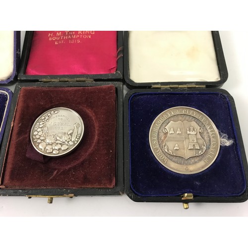 111 - MISC. CASED SILVER MEDALS