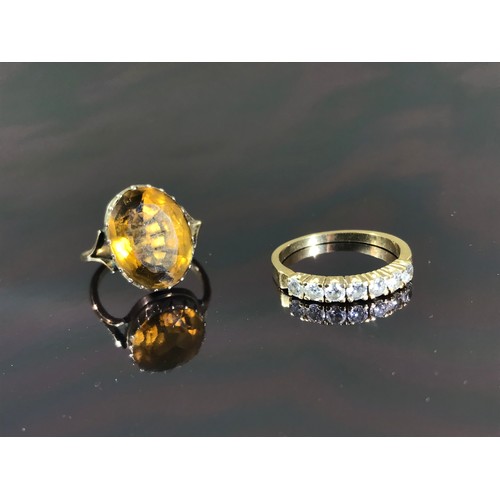 490 - HALF HOOP RING SET WITH 7 WHITE STONES AND A 9 CARAT GOLD SMOKY QUARTZ DRESS RING