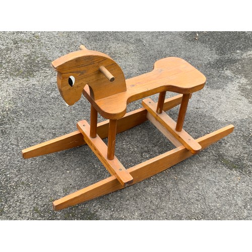 77 - SMALL WOODEN ROCKING HORSE.