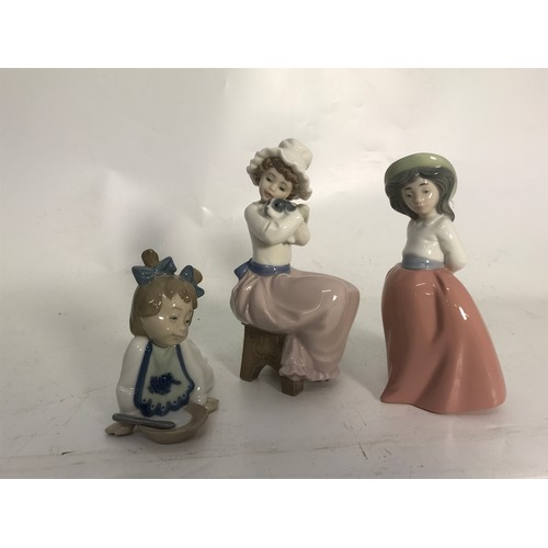 144 - NAO 2 FIGURINES OF YOUNG CHILDREN AND A CRAWLING BABY