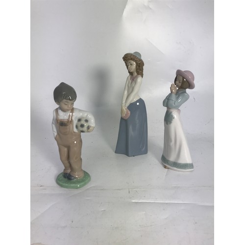 146 - 2 NAO FIGURINES OF GIRLS AND A CHILD