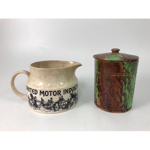 168 - SPONGE DECORATION TOBACCO JAR AND A UNITED MOTOR INDUSTRIES JUG BY CROWN DEVON