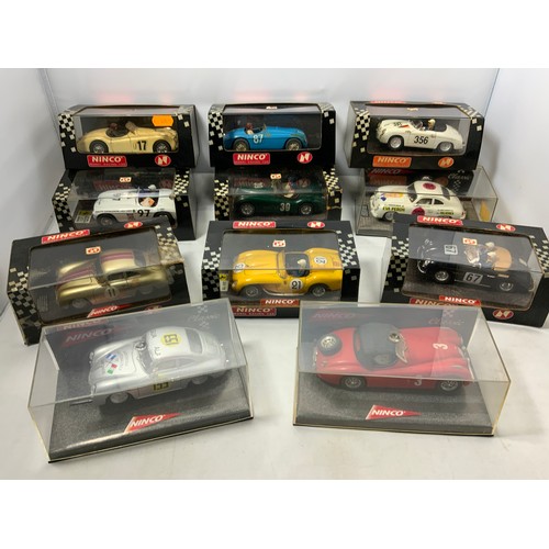 112 - 11 NINCO PLASTIC BOXED MODEL RACING CARS