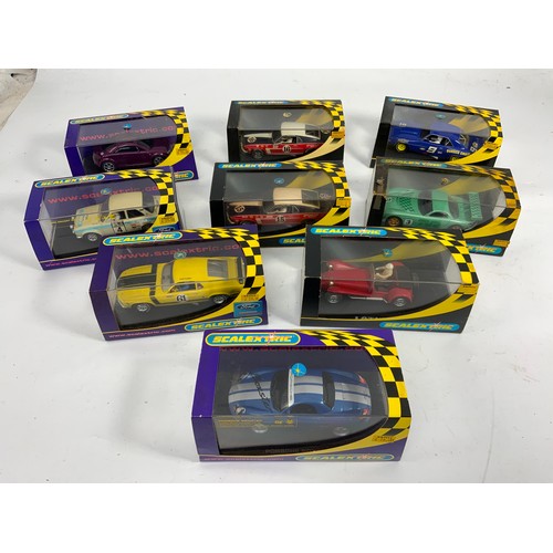 118 - 9 CARD AND PLASTIC BOX SCALEXTRIC MODEL VEHICLES, C2200 LOTUS 7, C2401 FORD MUSTANG, C2402 FORD MUST... 