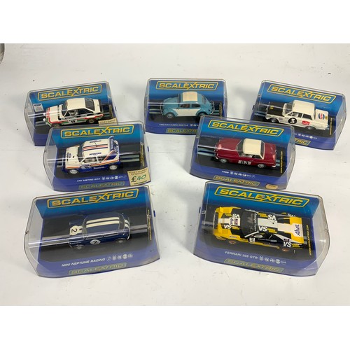 121 - SCALEXTRIC, 7 BOXED MODELS, C3416 FORD ESCORT, C3204 VW BEETLE, C2974 FERRARI 308 GTB, C3096 FORD CO... 