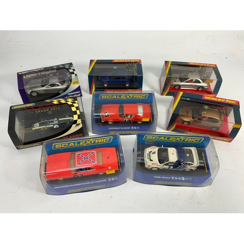 129 - 3 BOXED SCALEXTRIC MODEL CARS, C3001 CHEVROLET CAMARO, C3044 1969 DODGE CHARGER, C31564 FORD RS200, ... 