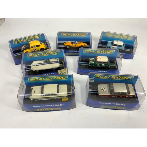 123 - 7 SCALEXTRIC BOXED SLOT CARS, C3412 VOLKSWAGEN BEETLE, C3212 FORD ESCORT, C3308 JAGUAR D TYPE, C2913... 