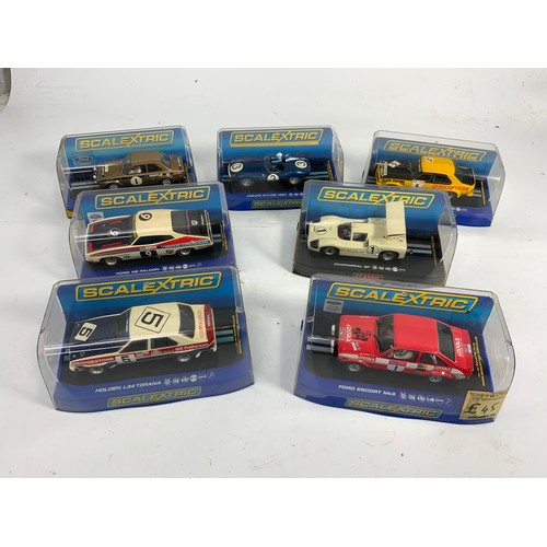 122 - 7 BOXED SCALEXTRIC CARS, C3483 FORD ESCORT, ROGER CLARK, C2920 FORD ESCORT, C3205 JAGUAR D TYPE, C31... 