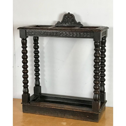 144 - CARVED OAK STICK STAND WITH BOBBIN TURNED SUPPORTS AND ORIGINAL DRIP TRAY