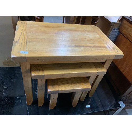 244 - NEST OF 3 LIGHT OAK OCCASIONAL TABLES