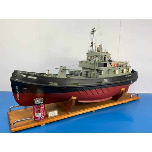 20 - RADIO CONTROLLED ROYAL FLEET AUXILIARY VESSEL, A161, LOYAL MEDIATOR, APPROX. cm LONG, ON WOODEN PLIN... 