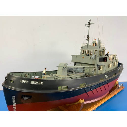 20 - RADIO CONTROLLED ROYAL FLEET AUXILIARY VESSEL, A161, LOYAL MEDIATOR, APPROX. cm LONG, ON WOODEN PLIN... 