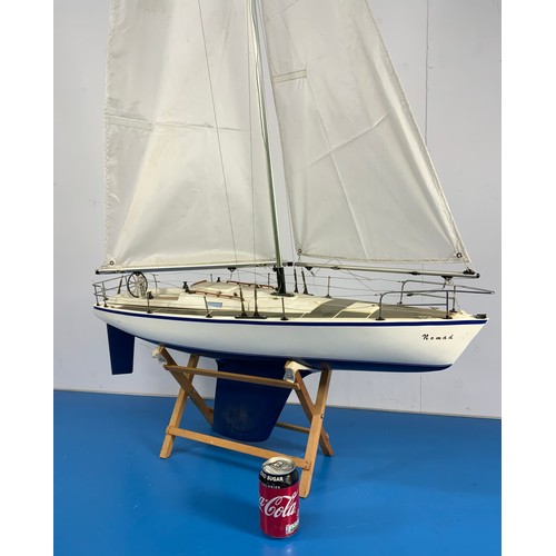 24 - RADIO CONTROLLED YACHT, NOMAD, APPROX. 90 cm LONG.