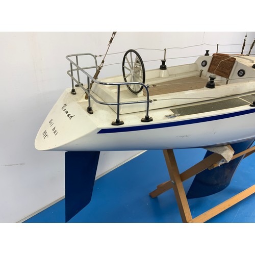 24 - RADIO CONTROLLED YACHT, NOMAD, APPROX. 90 cm LONG.