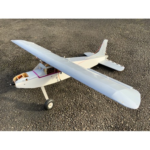 45 - RADIO CONTROLLED MODEL AIRCRAFT - SOR, WHITE / GREY WITH BLACK & RED DECOR. APPROX 120 CM LONG