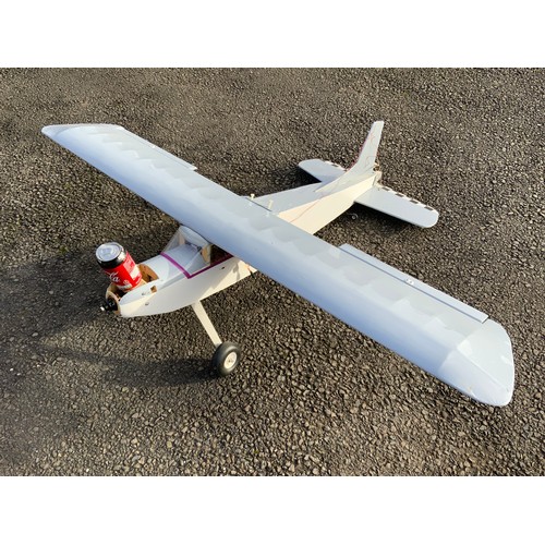 45 - RADIO CONTROLLED MODEL AIRCRAFT - SOR, WHITE / GREY WITH BLACK & RED DECOR. APPROX 120 CM LONG