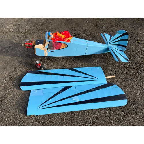 46 - RADIO CONTROLLED MODEL AIRCRAFT - BLUE G-BSER, MONOPLANE WITH PARACHUTIST. SOR, APPROX 180 cm LONG.