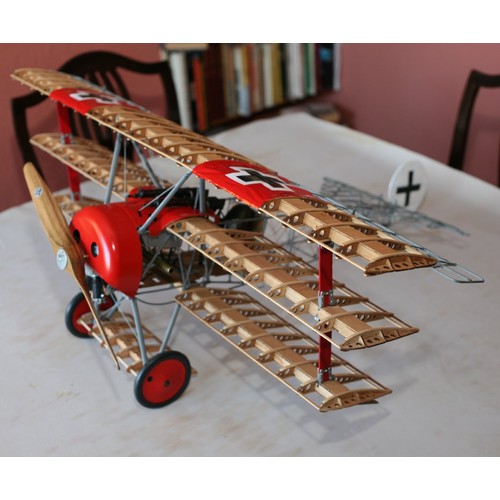 51 - THE RED BARON’S FOKKER DR1 TRIPLANE. A DETAILED STATIC MODEL IN 1:8 SCALE, BUILT FROM HATCHETTE PART... 