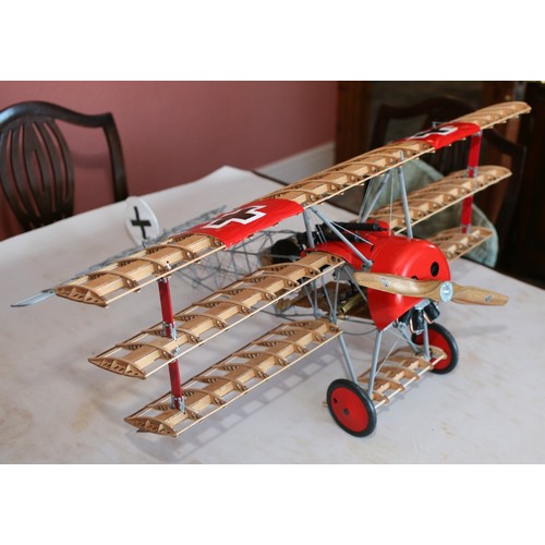 51 - THE RED BARON’S FOKKER DR1 TRIPLANE. A DETAILED STATIC MODEL IN 1:8 SCALE, BUILT FROM HATCHETTE PART... 