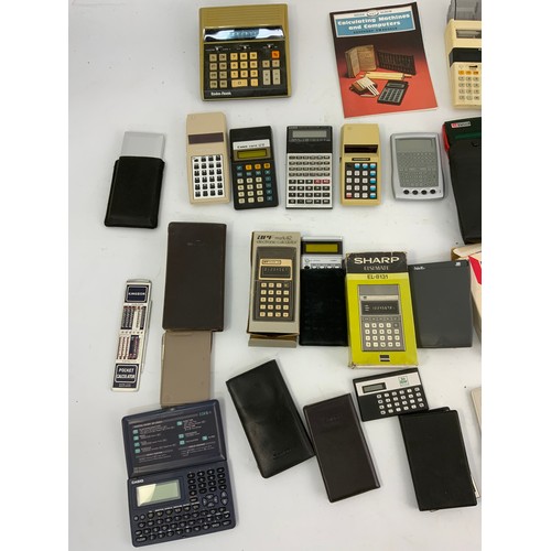 363 - COLLECTION OF VINTAGE CALCULATORS, MANY BOXED, COMMODORE, ROCKWELL, SHARP, CASIO, SHARP, TEXAS ETC.