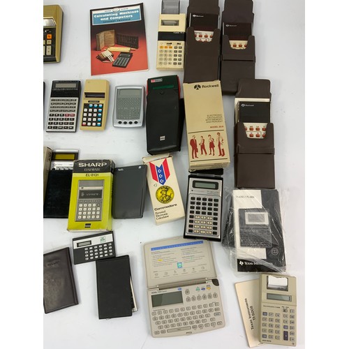 363 - COLLECTION OF VINTAGE CALCULATORS, MANY BOXED, COMMODORE, ROCKWELL, SHARP, CASIO, SHARP, TEXAS ETC.