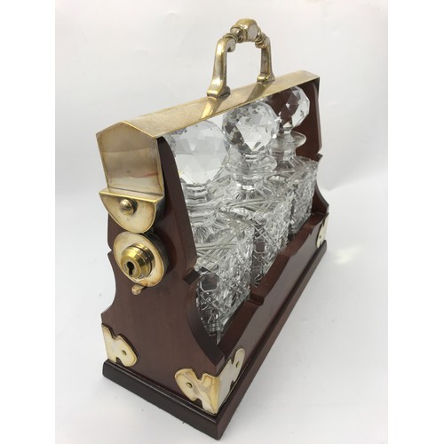 559 - GOOD QUALITY TANTALUS DECANTER SET