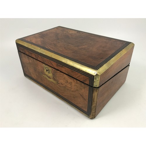 551 - BRASS BOUND WALNUT BOX AND CONTENTS