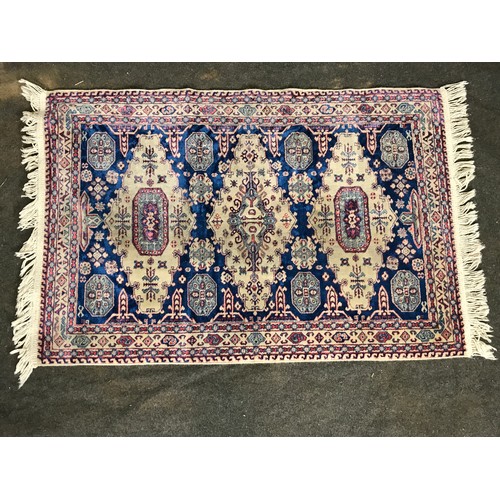 418 - PINK AND BLUE GROUND SILK RUG, APPROX 110CM LONG