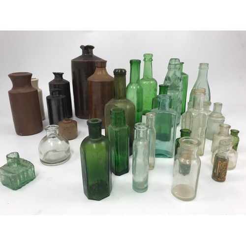 457 - COLLECTION OF ANTIQUE STONEWARE  & GLASS JARS & BOTTLES