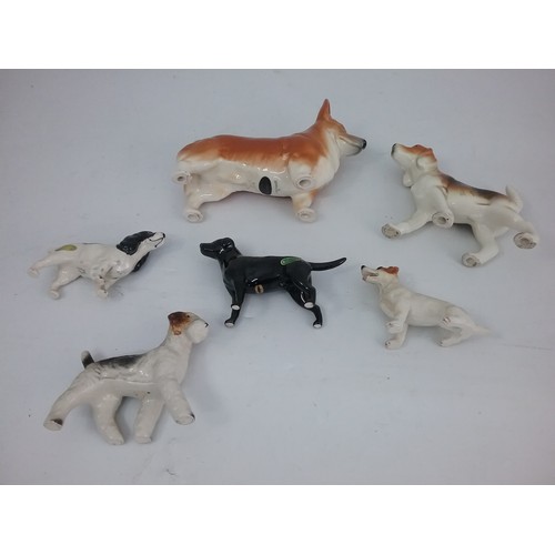 162 - COLLECTION OF DOG FIGURINES