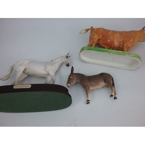 106 - ROYAL DOULTON  DESERT ORCHID, BESWICK DONKEY & A BULL MODEL