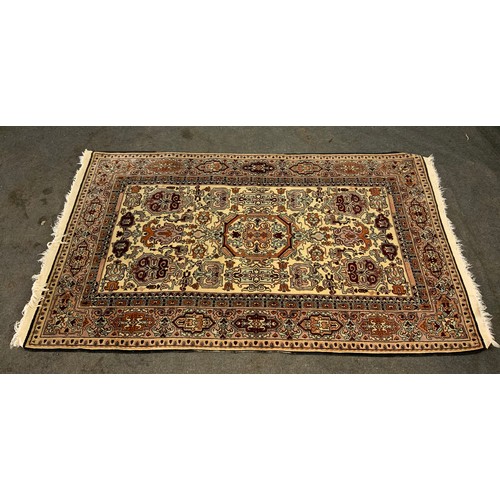 428 - PATTERED CREAM GROUND RUG APPROX. 247 cm x 140 cm.