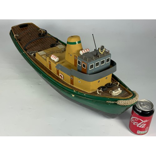 2 - WOODEN MODEL OF A CLASSIC HARBOUR TUG, APPROX. 77 CM LONG, WITH RADIO CONTROL & MOTOR IN THE HULL.