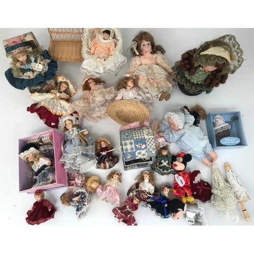 503 - COLLECTION OF SMALLER DOLLS ETC.