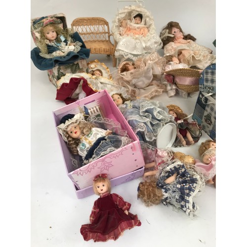 503 - COLLECTION OF SMALLER DOLLS ETC.