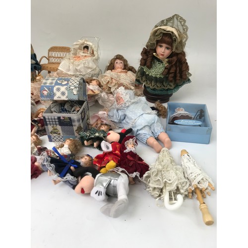 503 - COLLECTION OF SMALLER DOLLS ETC.