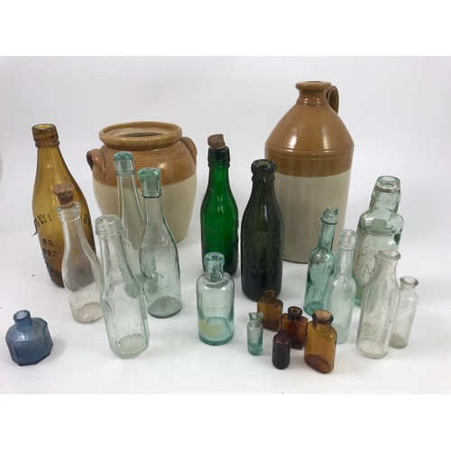 390 - COLLECTION OF OLD BOTTLES INC. POP BOTTLES TOGETHER WITH 2 STONE WARE JARS