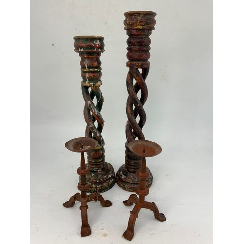 357 - PAIR OF BLACKSMITH MADE PRICKET CANDLESTICKS AND TWO TREEN PRICKET CANDLESTICKS