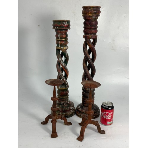 357 - PAIR OF BLACKSMITH MADE PRICKET CANDLESTICKS AND TWO TREEN PRICKET CANDLESTICKS