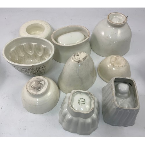 153 - COLLECTION OF JELLY MOULDS INCLUDING ONE WITH RECIPE FOR CORNFLOUR BLANC-MANGE