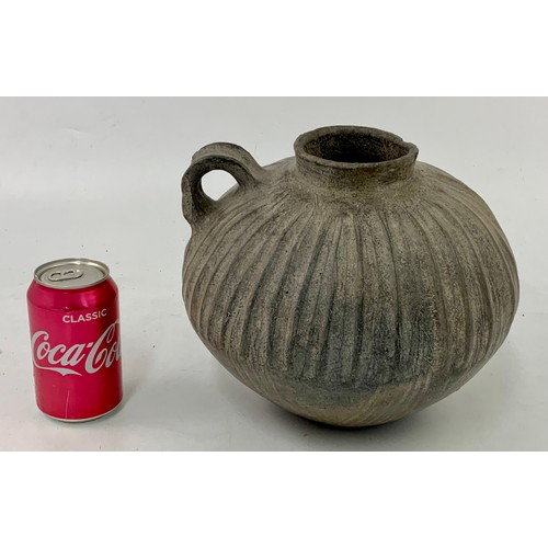 182 - STONEWARE VESSEL WITH RIBBED DECORATION AND SINGLE LOOP HANDLE, APPROX. 22.5 cm h.