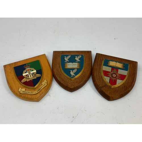 450 - THREE COLLEGIATE CRESTS MOUNTED