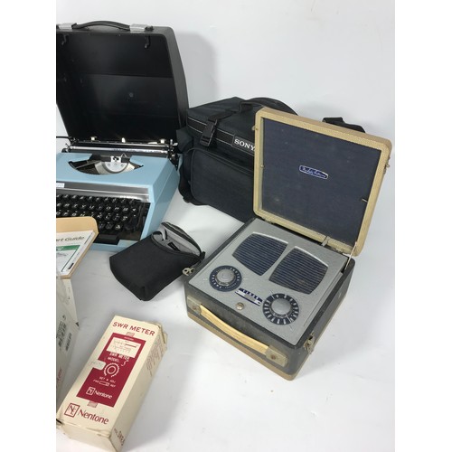 376 - QUEN DATA 610 DELUXE TYPEWRITTER, VINTAGE VIDOR RADIO,  SONY CAMERA BAG, CANON POWERSHOT A85 CAMERA ... 