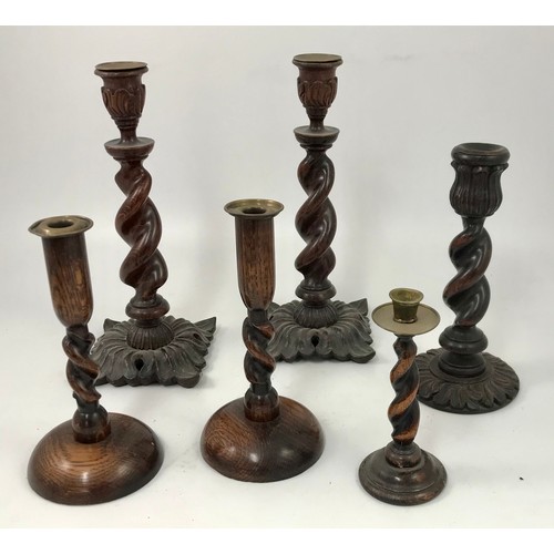 454 - 2 PAIRS OF IMPRESSIVE BARLEY TWIST WOODEN CANDLESTICKS AND 2 OTHERS