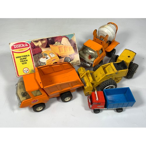 43 - BOXED MINI TONKA DUMP TRUCK 1230, PLUS 3 U/B TONKA TOYS