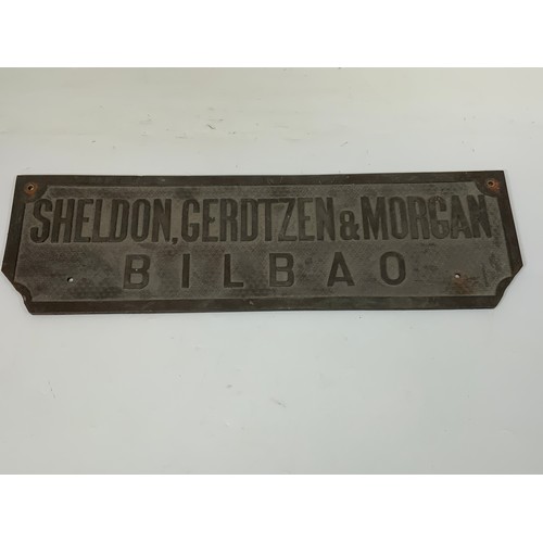 289 - CAST WORKS PLATE, SHELDON, GERDTZEN & MORGAN, BILBAO. APPROX. 50 X 15 cm, BOTH BOTTOM CORNERS A/F