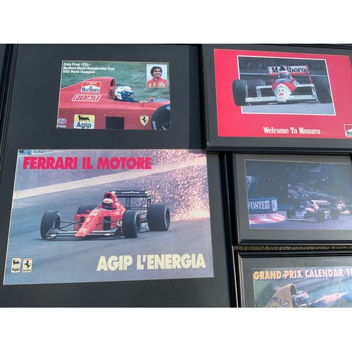 42 - QUANTITY OF FORMULA 1 RELATED FRAMED WALL POSTERS