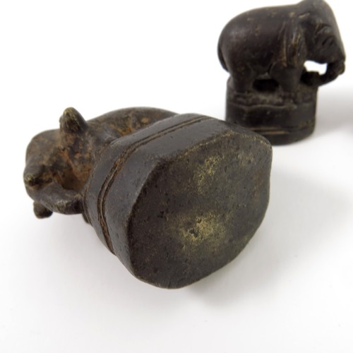 255 - A GRADUATED SET OF POSSIBLY TIBETAN BRONZE OPIUM WEIGHTS MODELLED AS ELEPHANTS